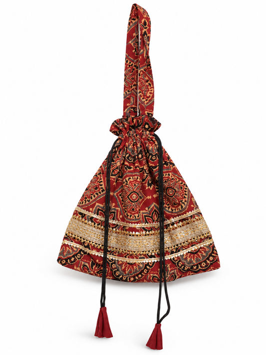 Maroon Printed Potli Bag with Traditional Ethnic Patterns, Golden Embellished Border, Long Handle, Drawstring Closure and Decorative Tassels for Women
