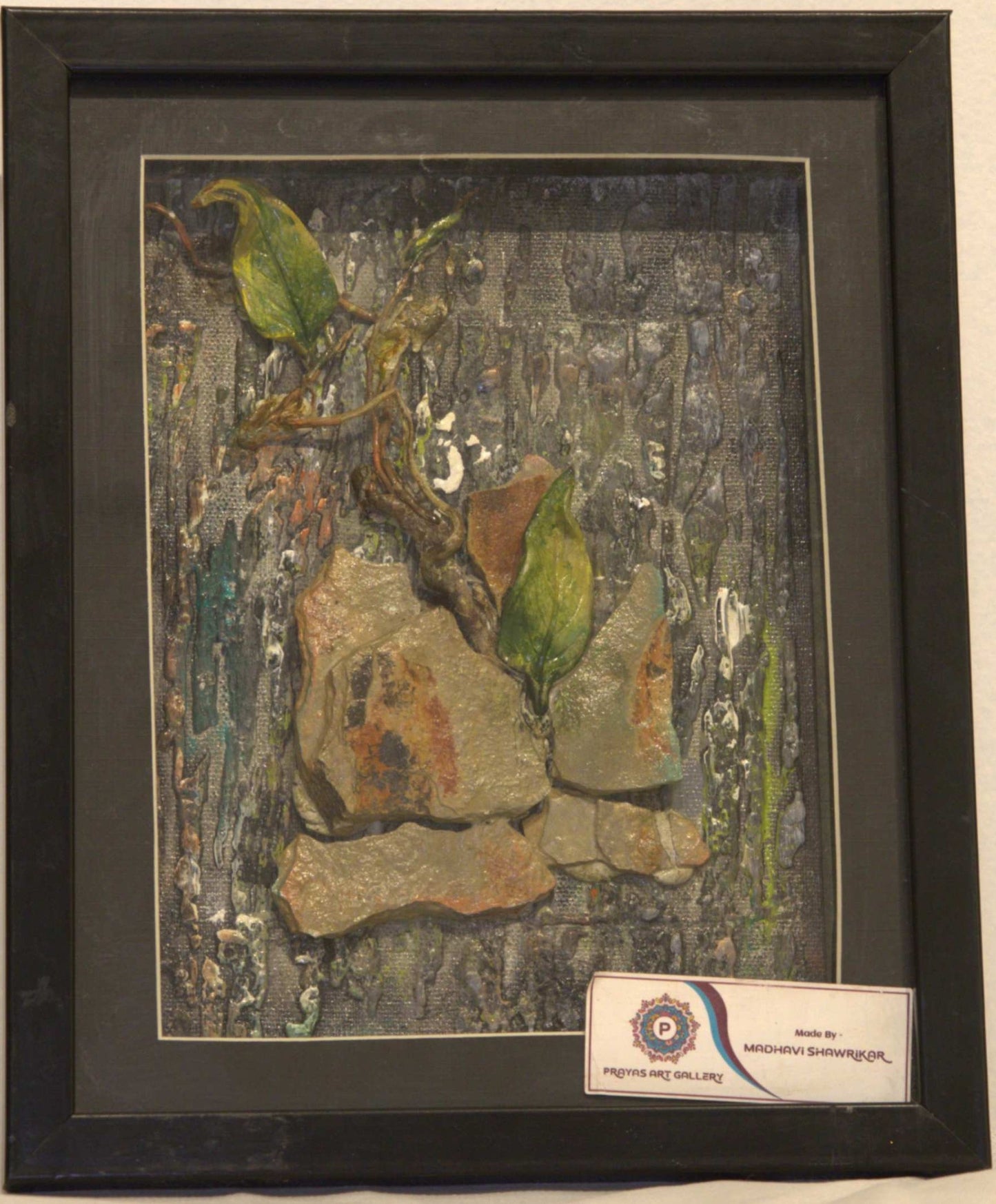 Rock with roots & leaves on it clay art