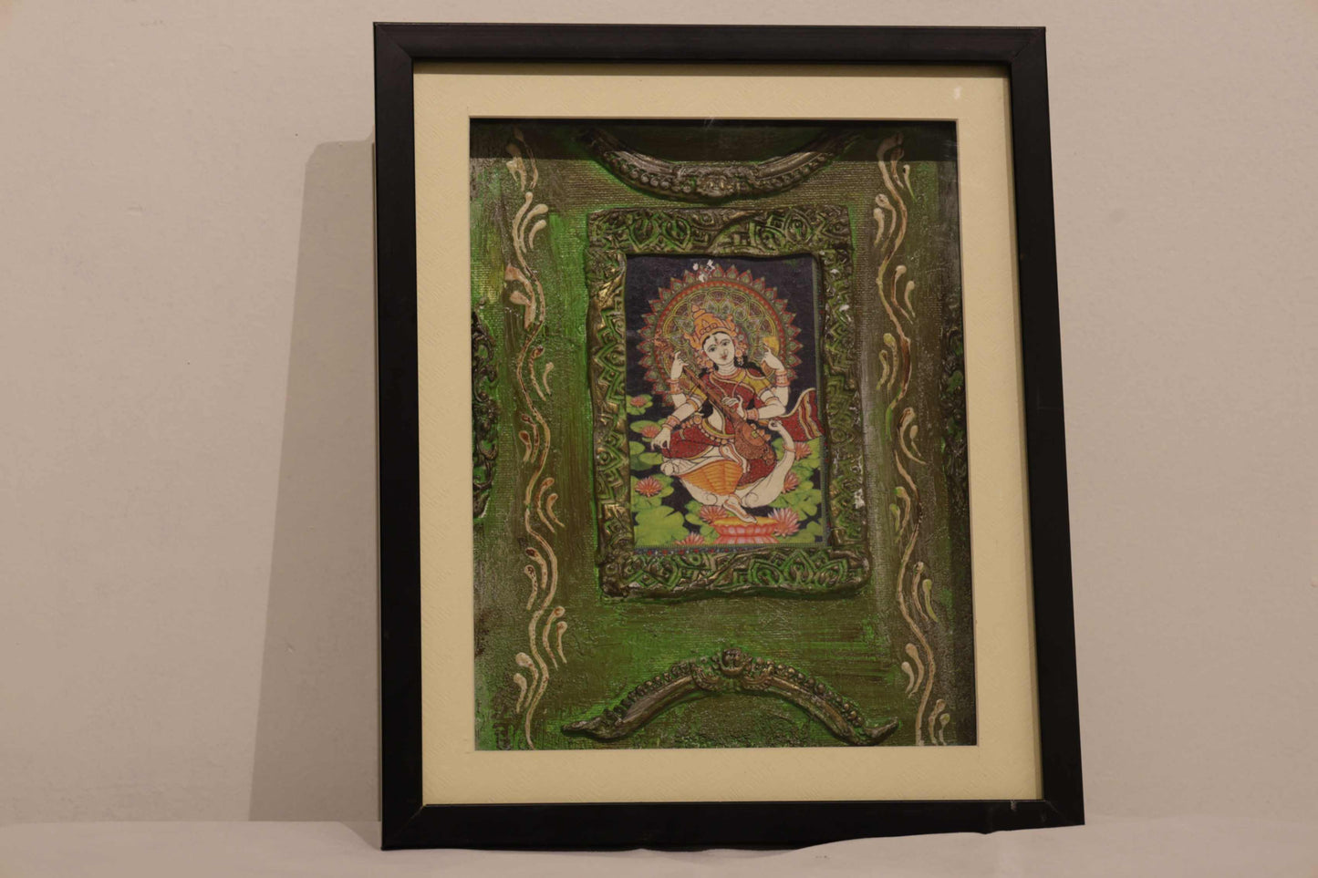 Saraswati with green background wall art